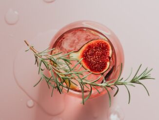 red fruit in clear glass bowl
