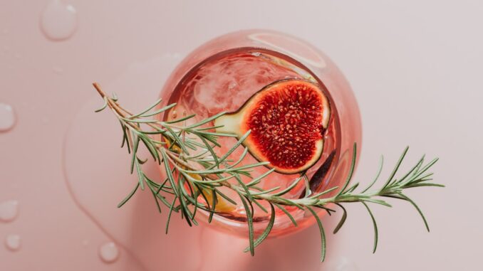 red fruit in clear glass bowl